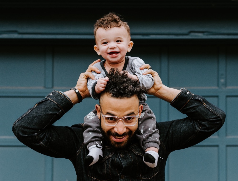Happy Dad with Kid on his head